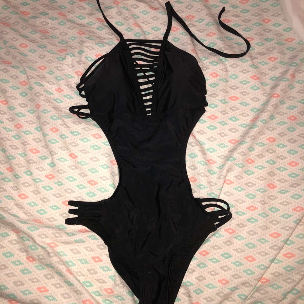 One piece black bathing suit with cutouts. Target